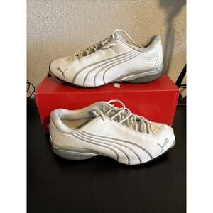 pair of white and silver Puma Jago Cell running shoes Size 7.5